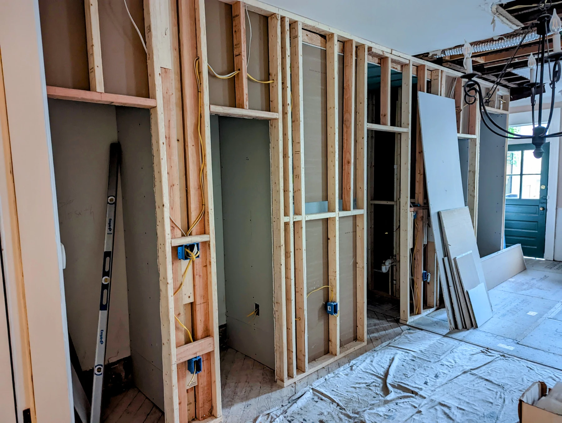 Exposed interior timber wall framing during a renovation